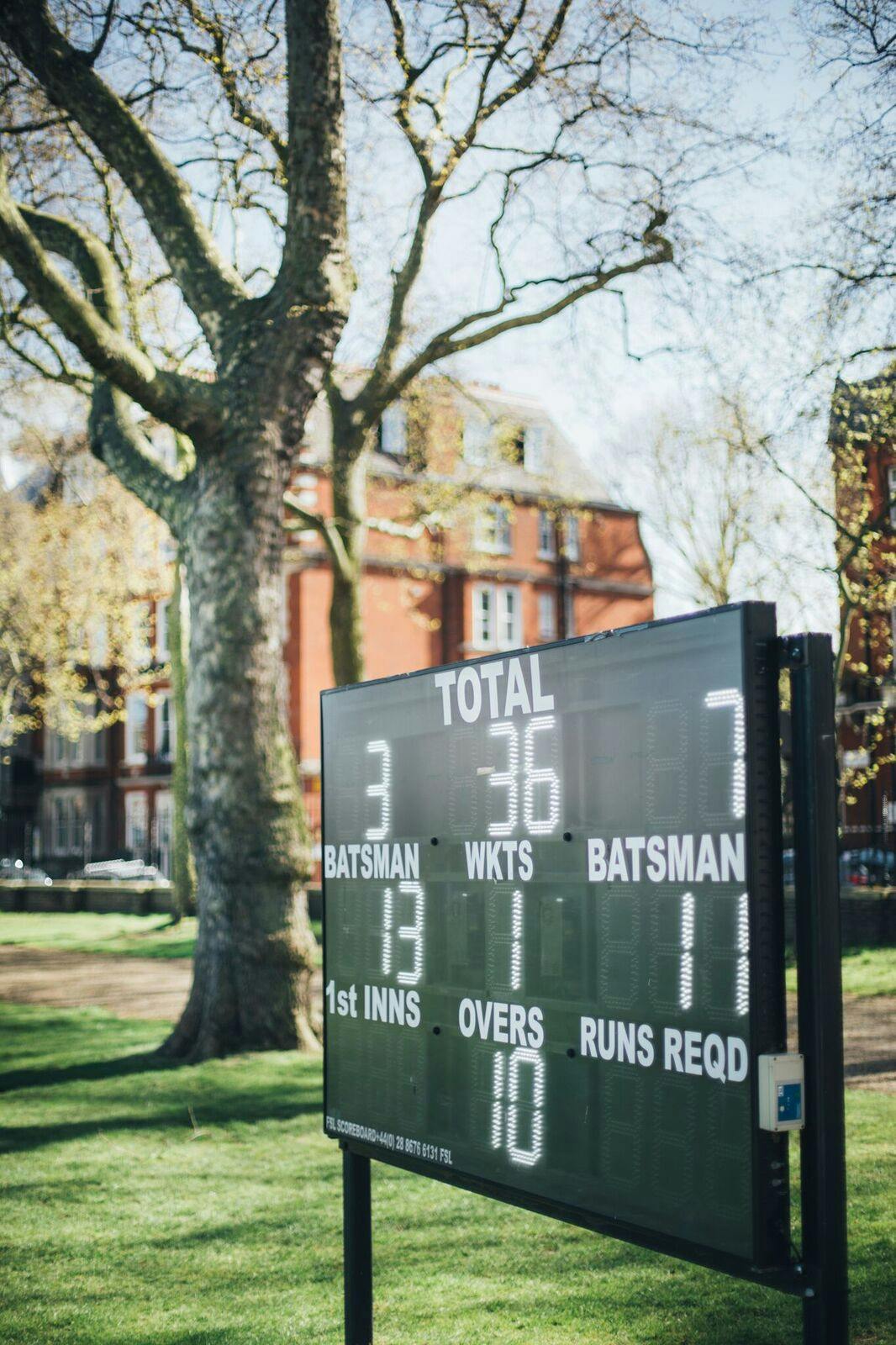 Cricket match scoreboard at Burton Court, Royal Hospital Chelsea for corporate events.