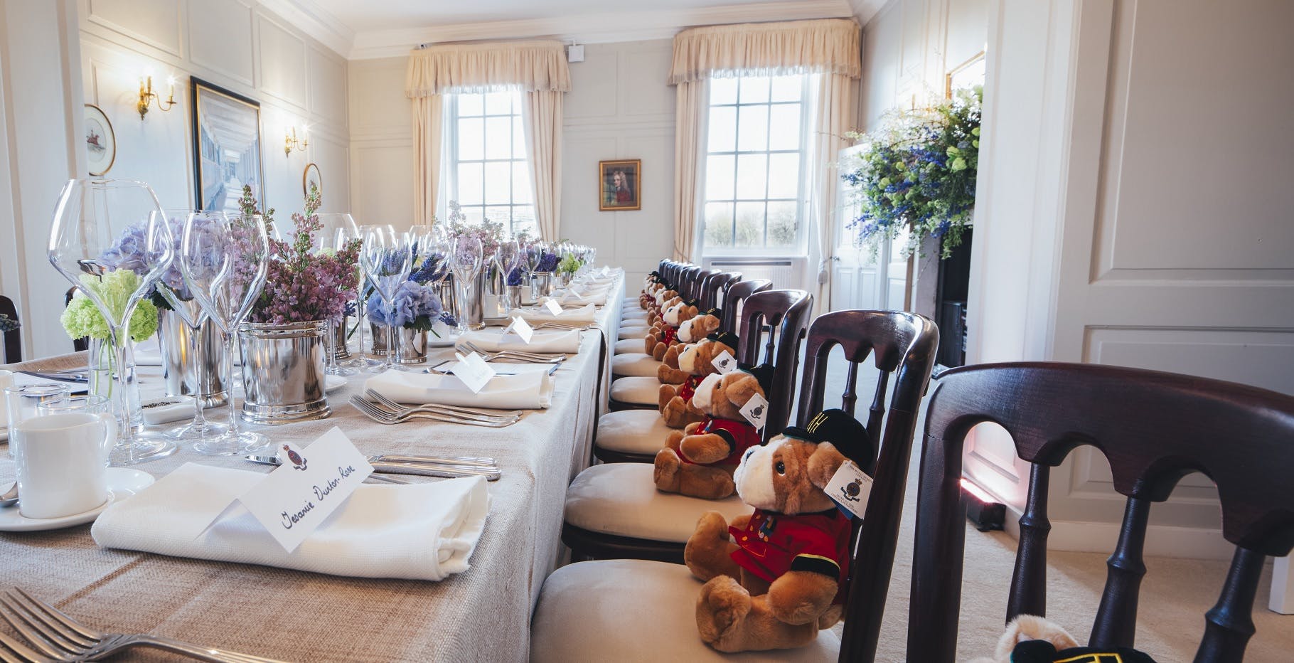 Elegant dining table at Wren House, Royal Hospital Chelsea for a themed children's event.