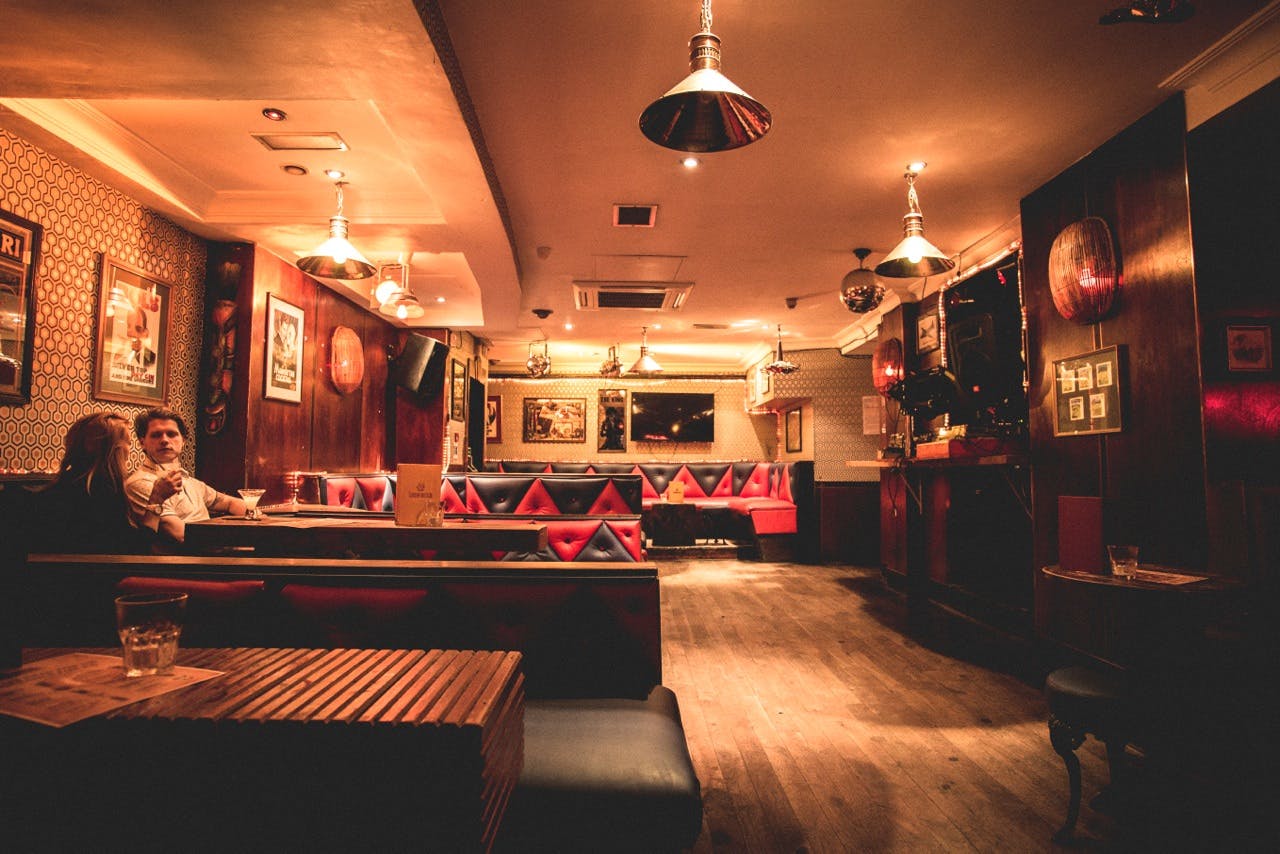 Stylish venue with warm lighting for networking events in Shoreditch.