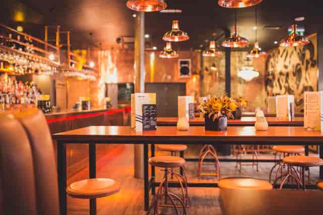 Stylish Walrus venue with warm lighting for intimate gatherings and networking events.