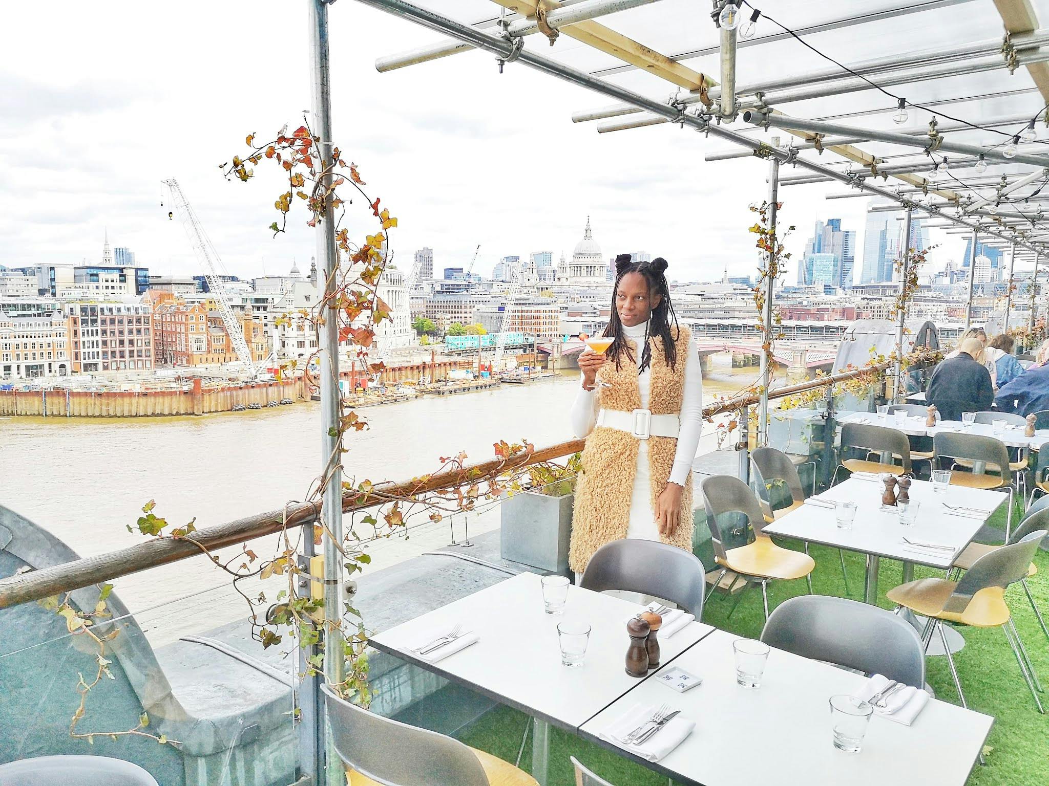 Stylish rooftop bar at OXO Tower with city skyline views, ideal for upscale events.