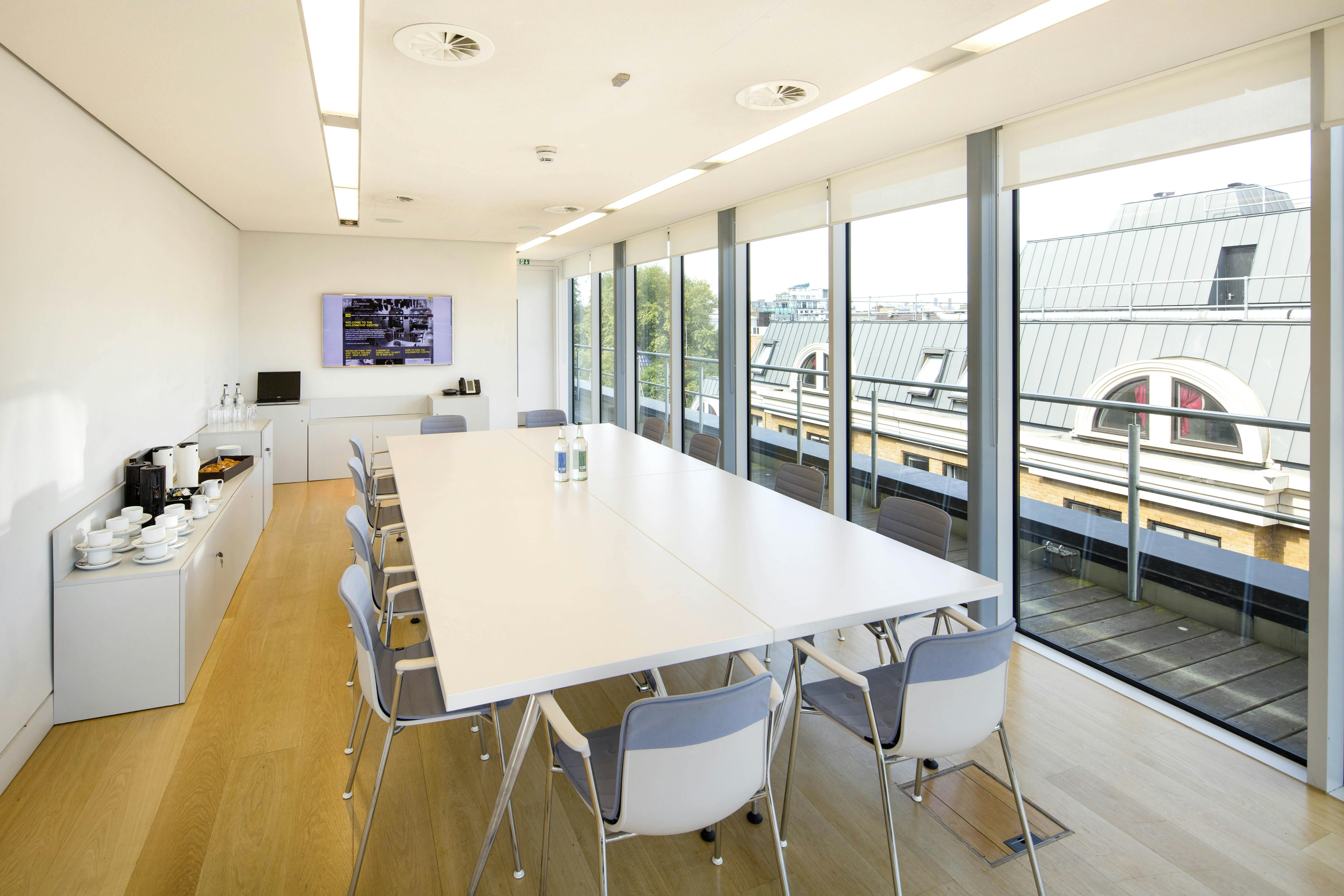 Agas Harding Board Room with white table, ideal for meetings and events at Goldsmiths' Centre.