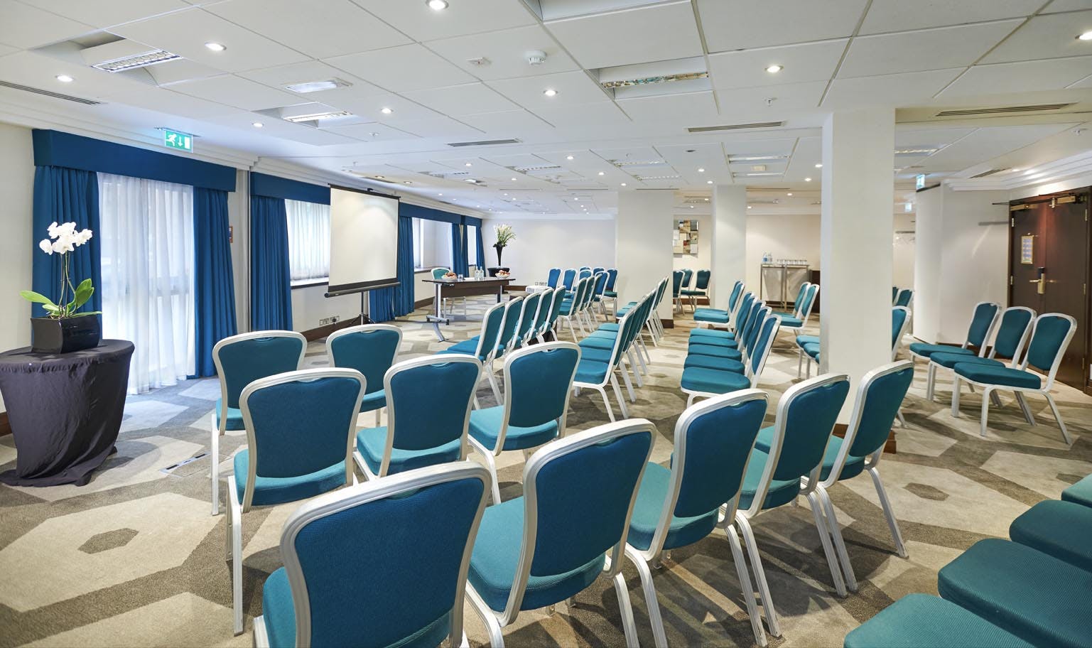 Kensington Suite at Hilton London Olympia, elegant meeting space for workshops and presentations.