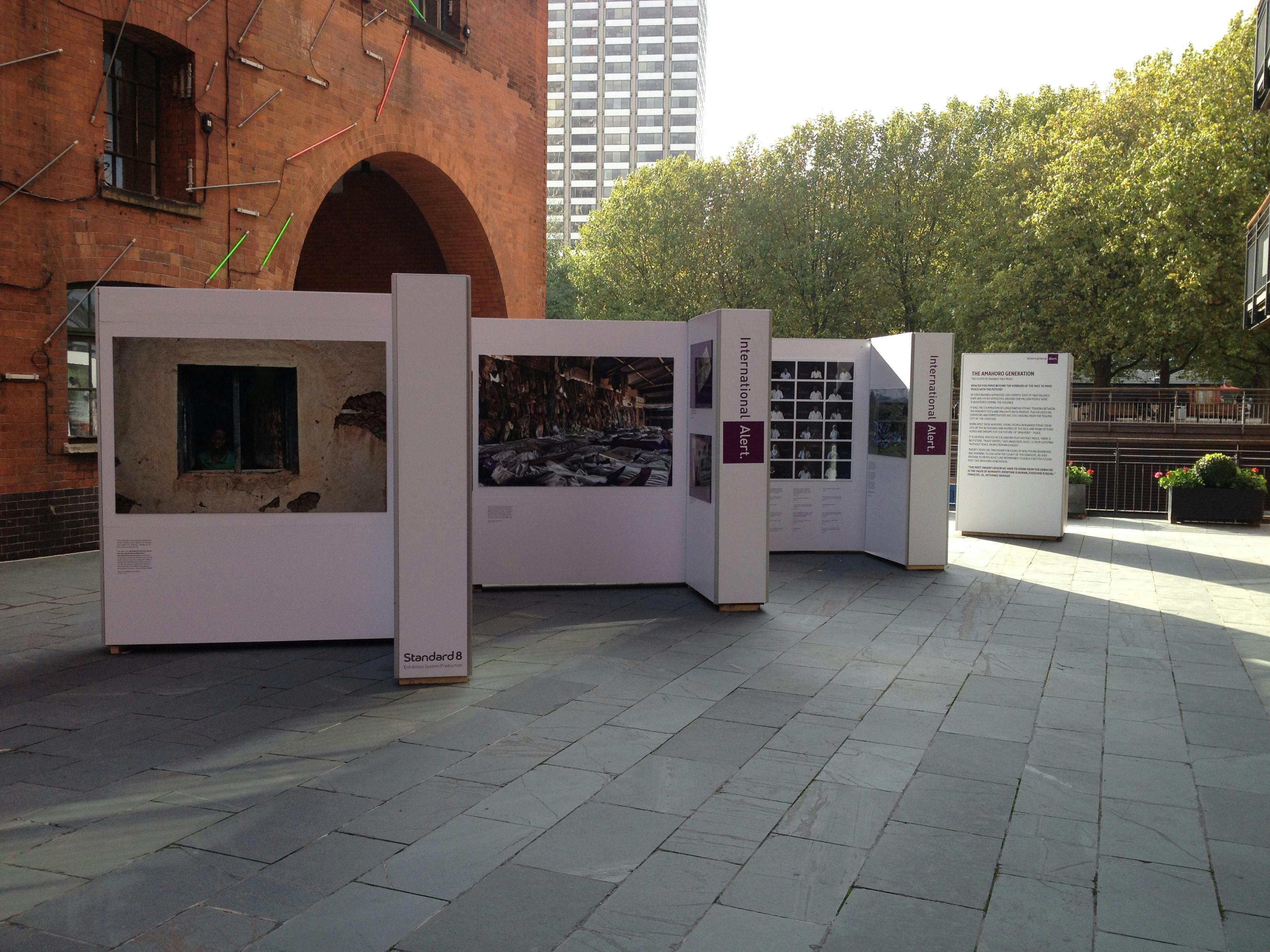Outdoor exhibition space at OXO Tower with display panels for networking events.