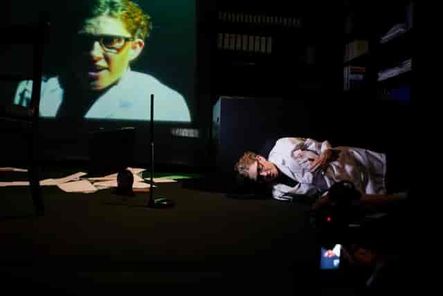 New Diorama Theatre performance setup with projection for creative events and innovation.