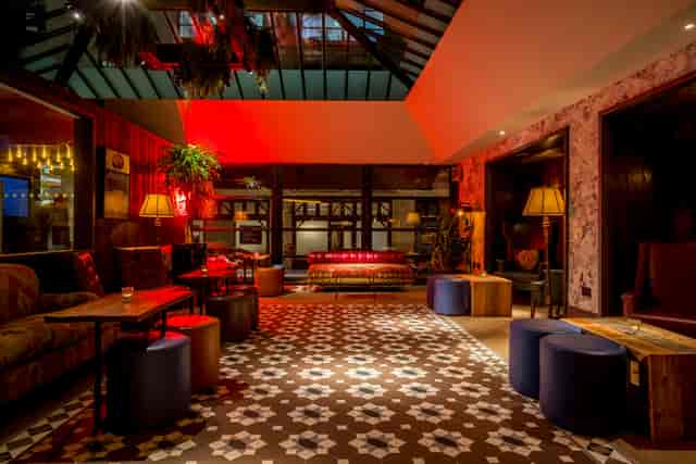 Atrium Room at 100 Wardour Street, stylish lounge for networking events and meetings.