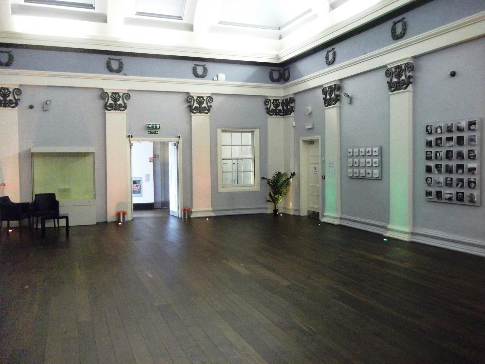 Elegant event space in Shrewsbury Museum with natural light, ideal for meetings and gatherings.