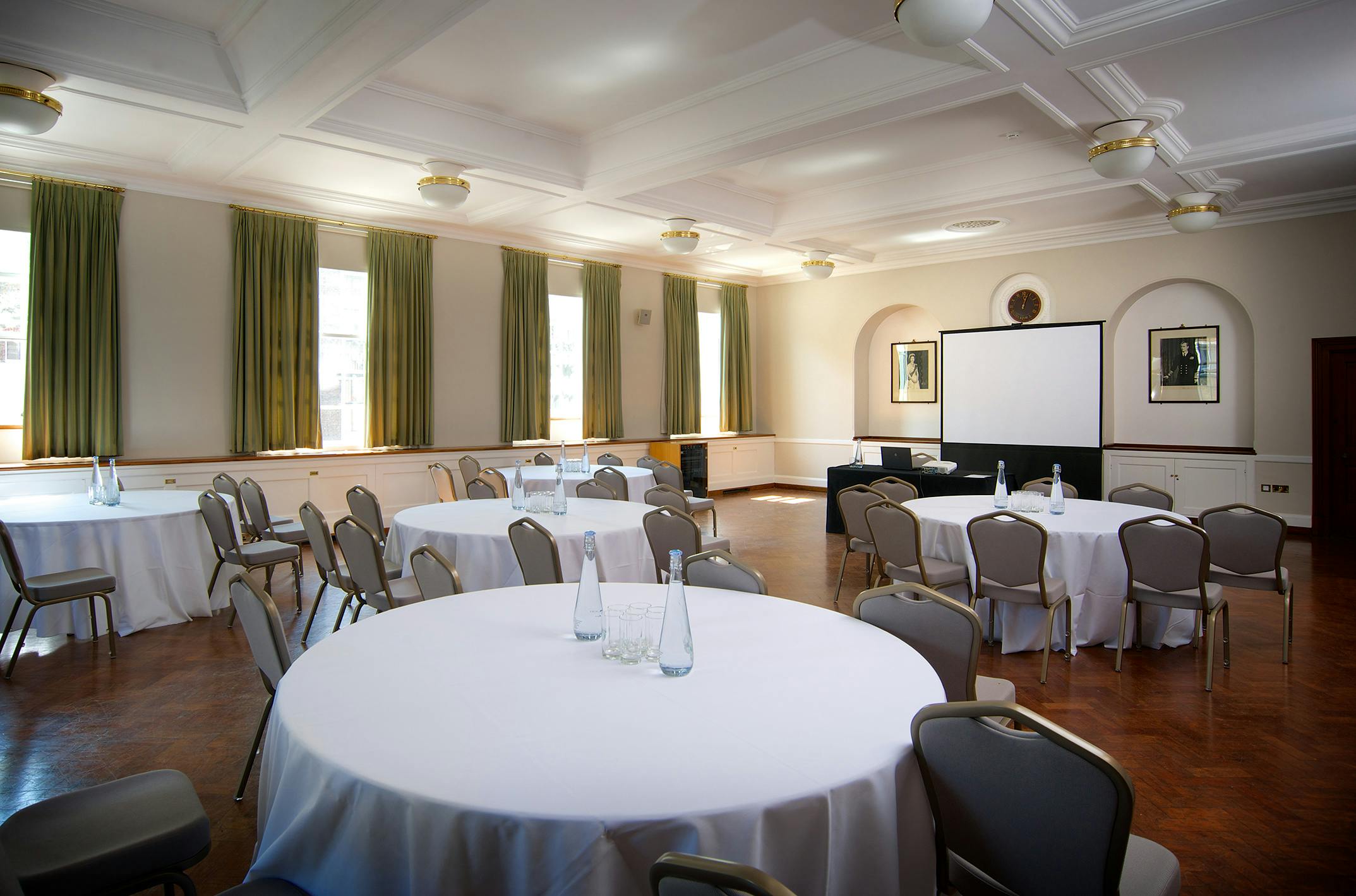 London House Large Common Room with round tables, ideal for meetings and banquets.