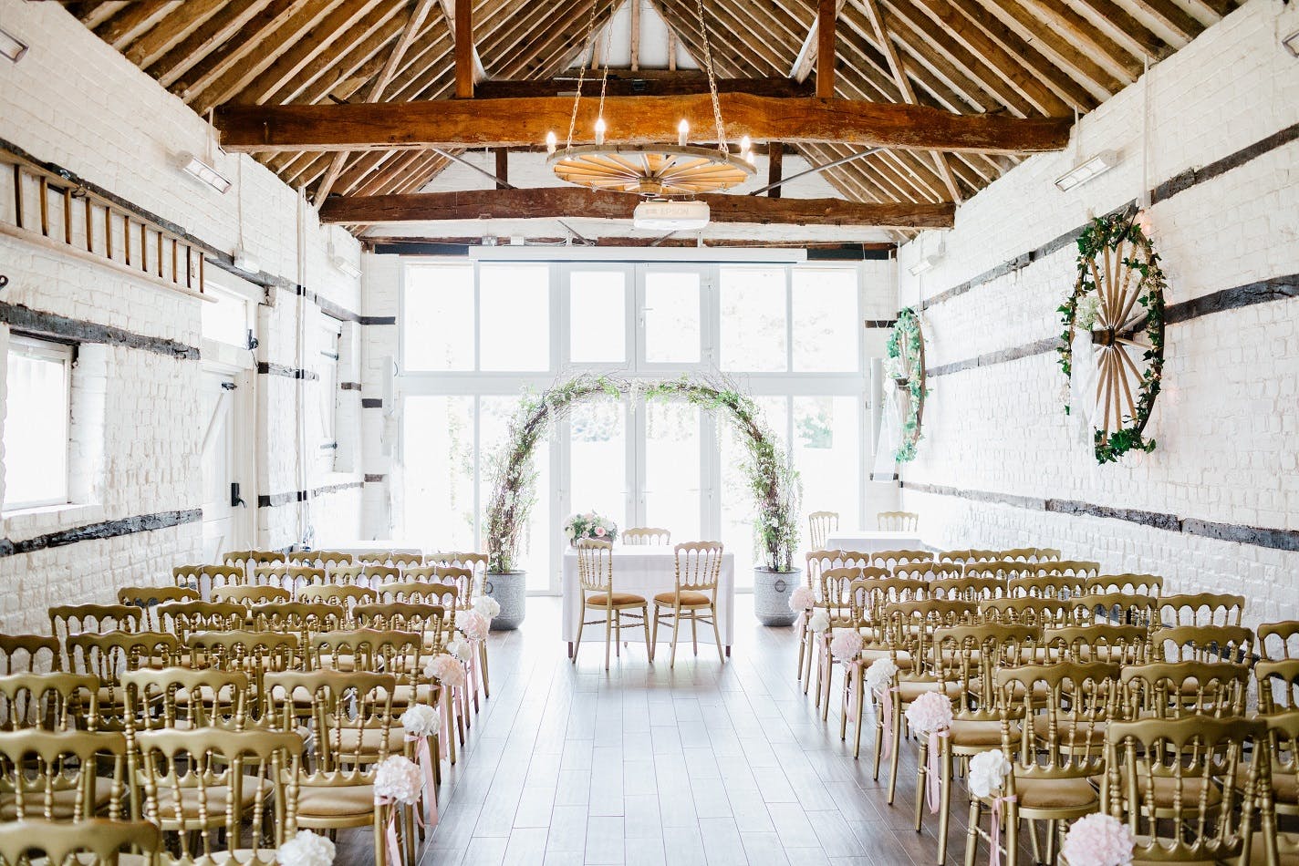 Lillibrooke Manor event space with wooden beams, ideal for weddings and corporate gatherings.