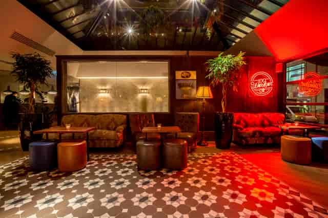 Stylish lounge at 100 Wardour Street, ideal for networking events and informal meetings.