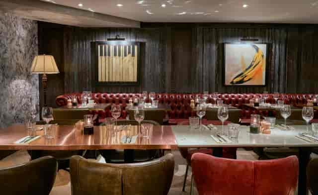 Elegant dining space at The Lounge, 100 Wardour Street, ideal for corporate dinners and events.
