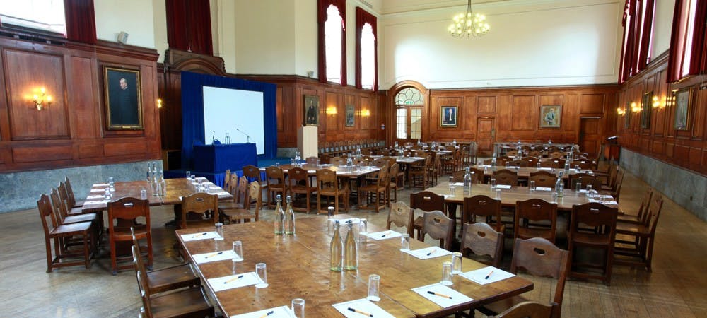 Spacious Great Hall in Goodenough House set for a conference with elegant decor.