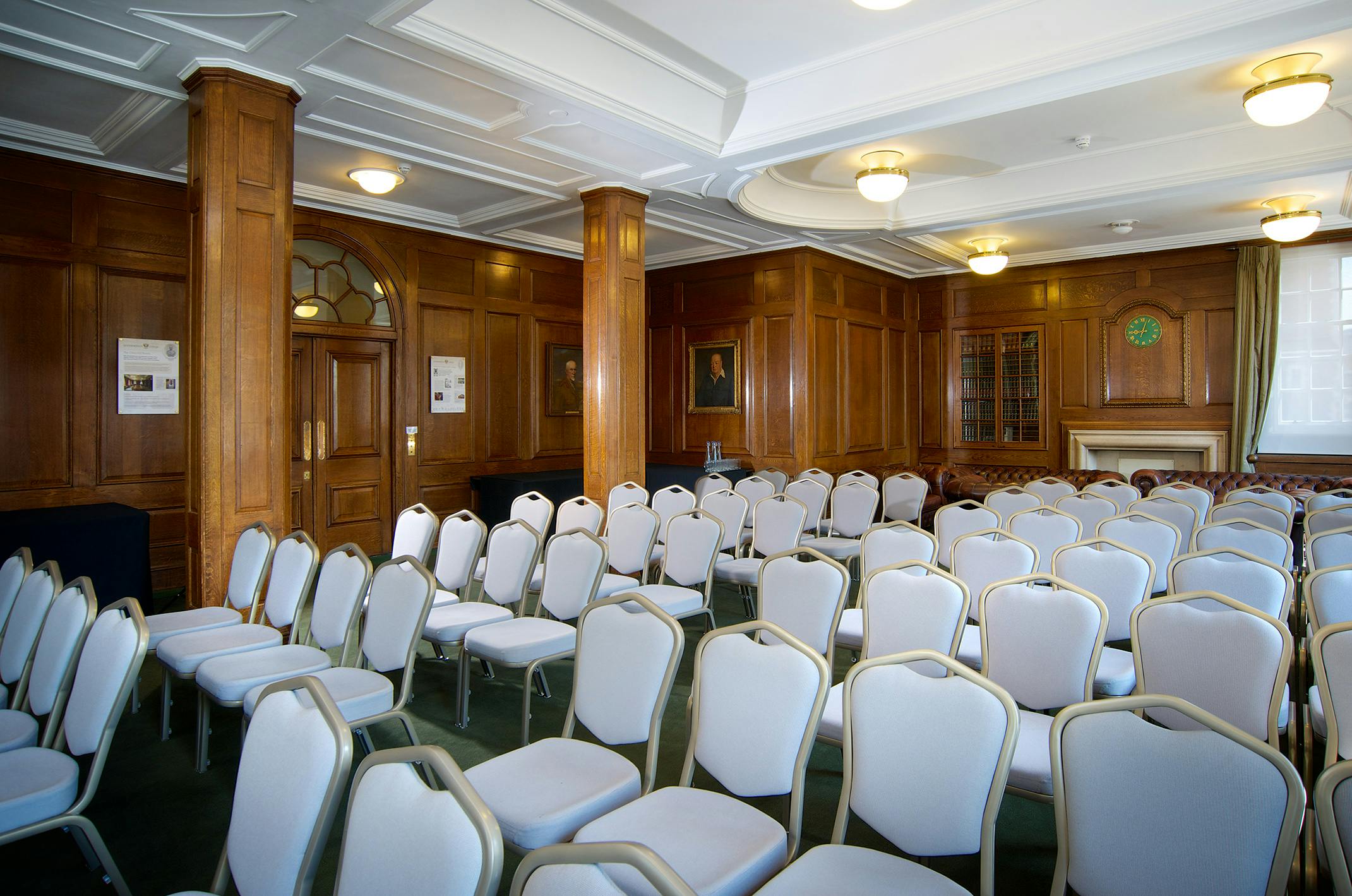 Churchill Room at Goodenough House, elegant chairs set for conferences and seminars.