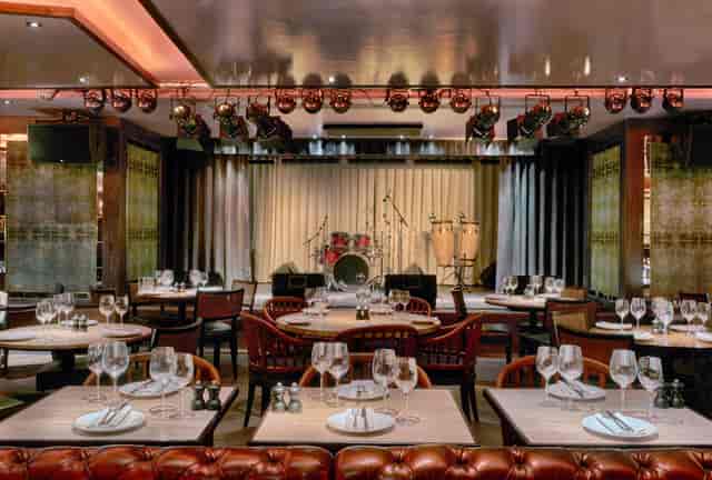 Elegant event space at The Club, 100 Wardour St, ideal for dining and live performances.
