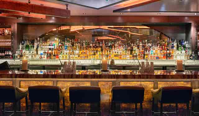 Stylish bar at The Club, 100 Wardour St, ideal for networking and cocktail receptions.