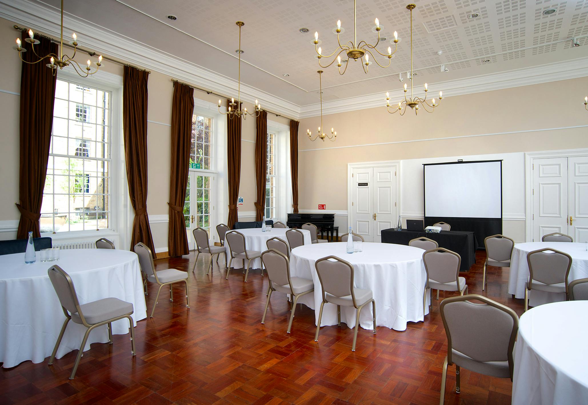 William Goodenough Large Common Room with elegant tables, ideal for meetings and receptions.