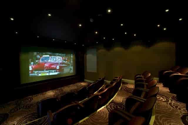 Upstage Mini Cinema at The Roseate, Reading: modern screening room for intimate events.