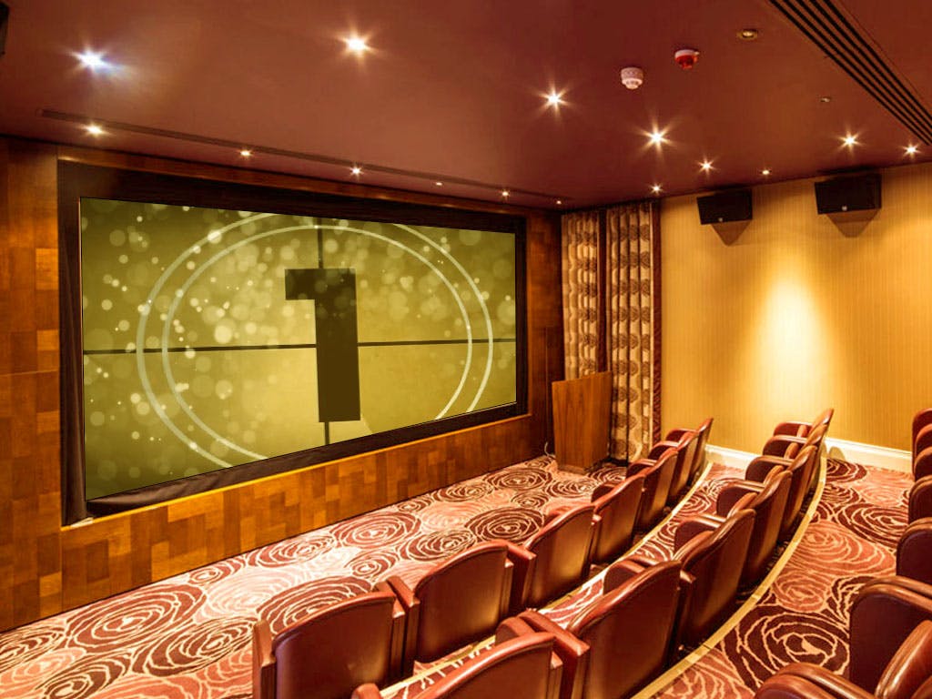 Upstage Mini Cinema at The Roseate: modern screening room for corporate events and private viewings.