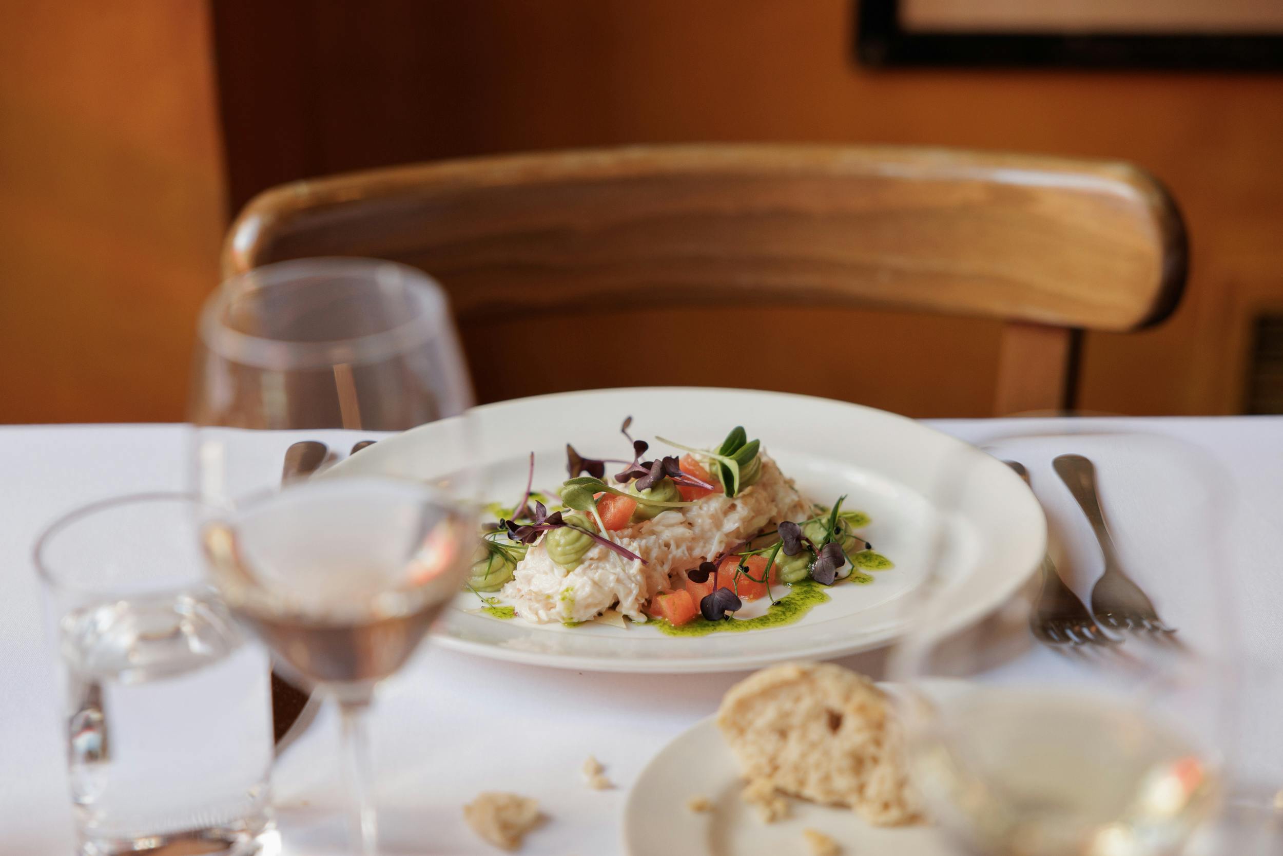 Elegant dish on a refined table in Bleeding Heart's No. 1 Dining Room for upscale events.