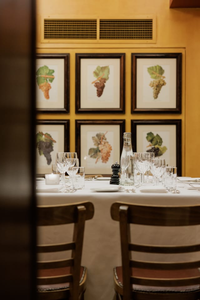 Elegant dining table setup in Bleeding Heart for corporate dinner or intimate event.