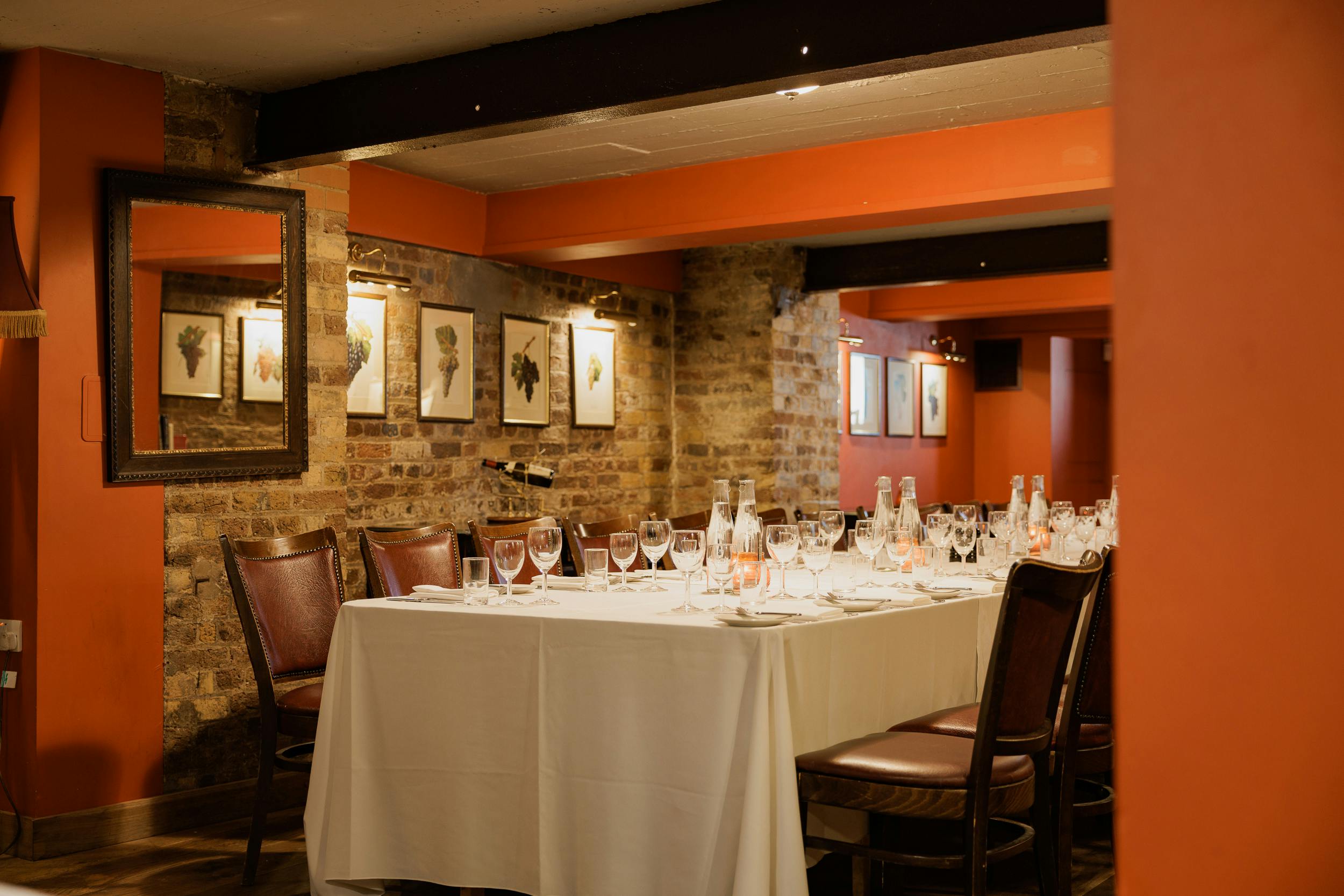 Elegant wine cellar dining room for corporate dinners and private events.