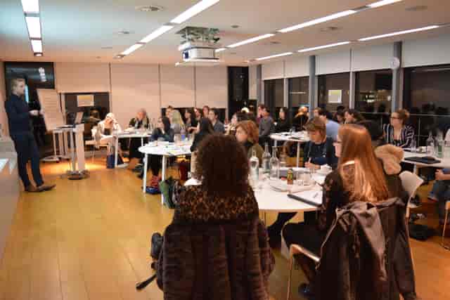 Agas Harding Conference Room with round tables for engaging presentations and networking.