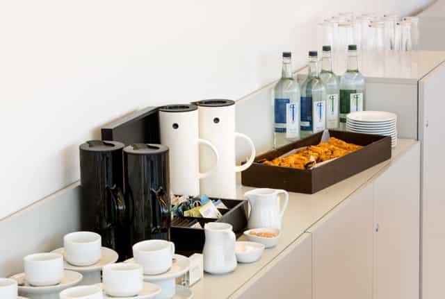 Agas Harding Board Room refreshment station for meetings with coffee, snacks, and water.