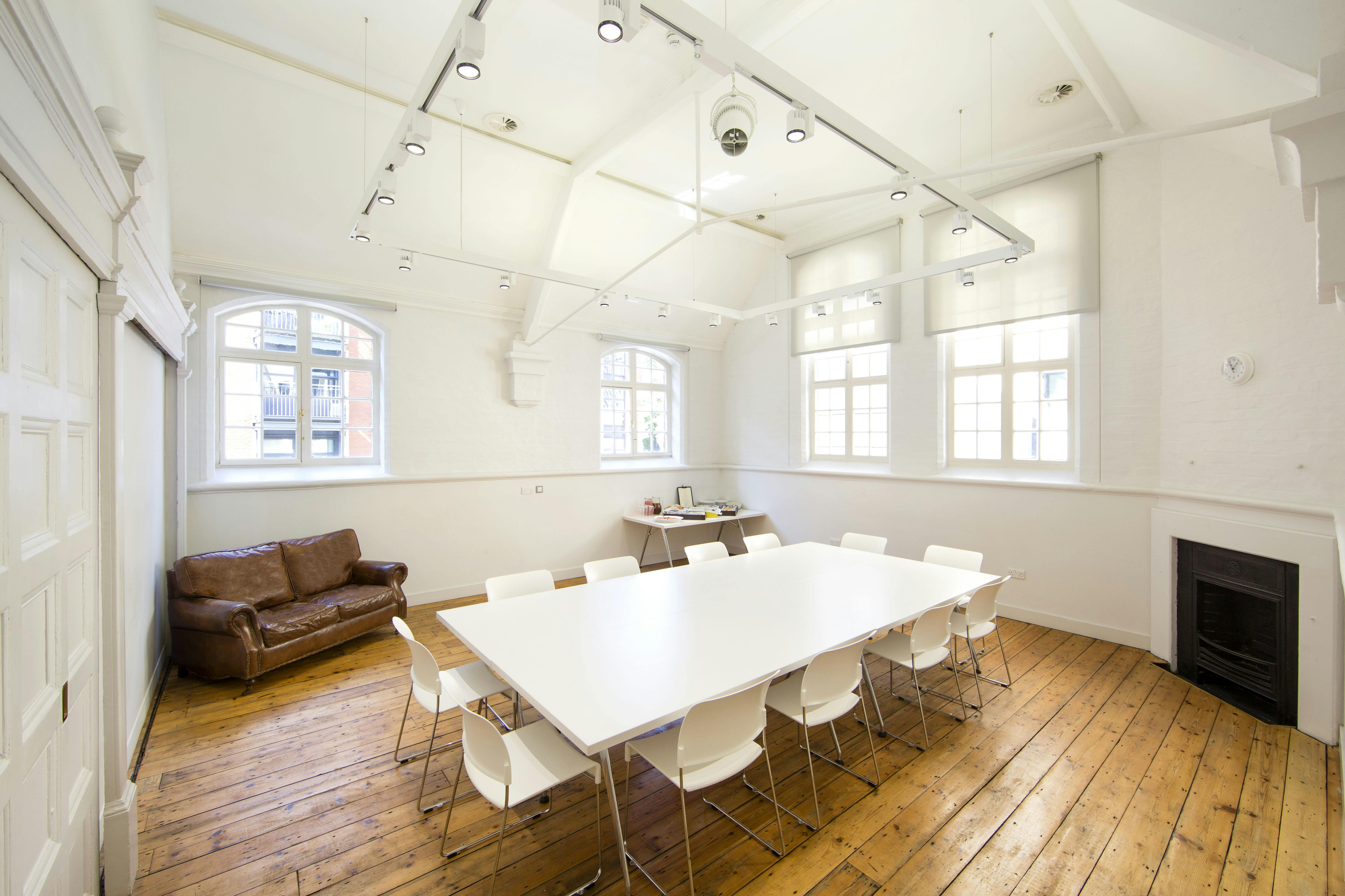 Bright modern meeting room at Creative Base, ideal for workshops and team meetings.