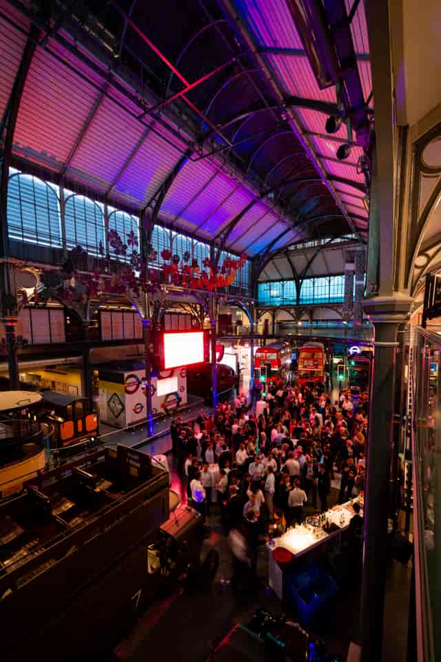 London Transport Museum event space with dramatic lighting for corporate receptions and gala events.