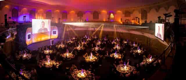 Church House Westminster Assembly Hall: Gala stage setup with hybrid event AV lighting.