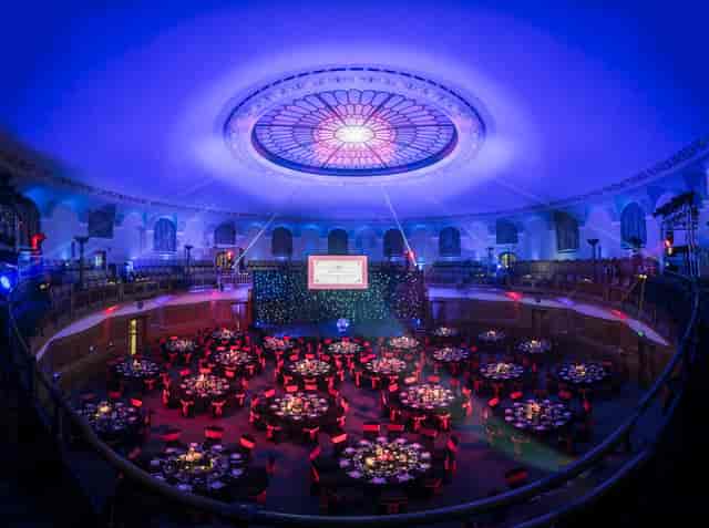 Gala setup with star-cloth lighting in Church House Westminster rotunda for corporate events.