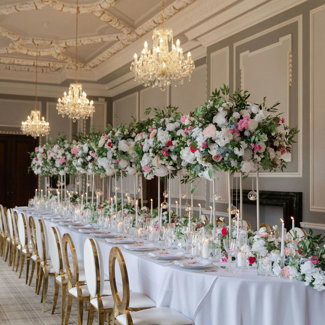 Elegant banquet table with floral centerpieces for weddings and gala dinners in Manchester Hall.