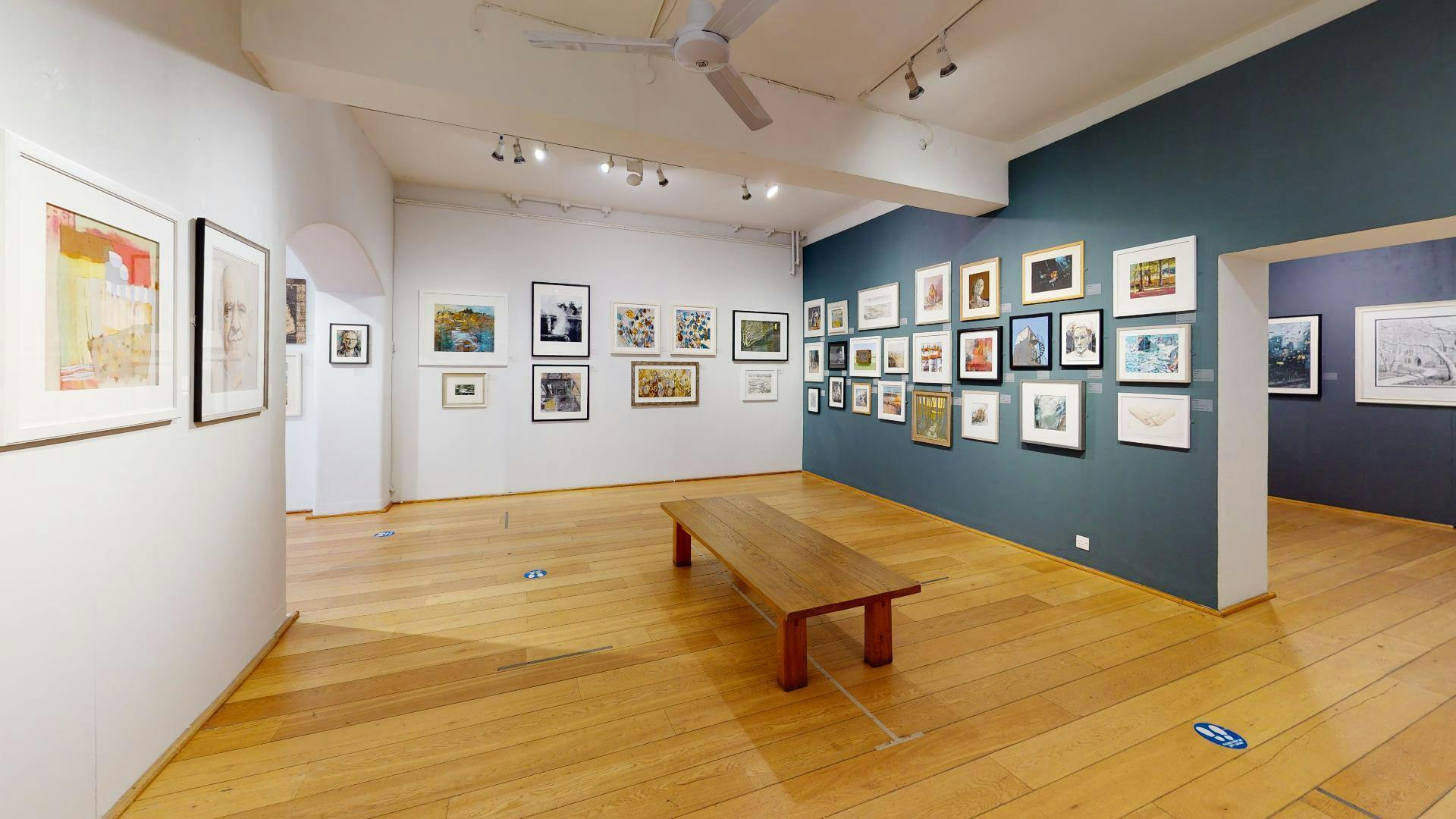 North Gallery at Mall Galleries: bright art space with framed artworks, ideal for events.