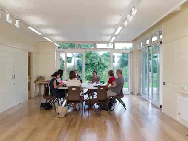 Collaborative meeting space with natural light, ideal for workshops in Weoley Castle.