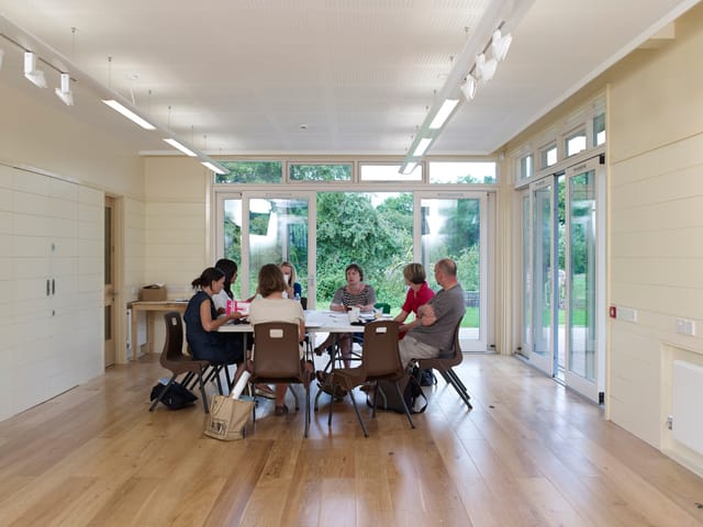 Collaborative meeting space with natural light, ideal for workshops in Weoley Castle.
