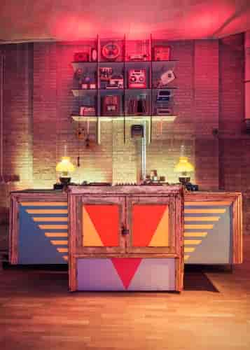 Main room at The Night Owl with vintage bar, ideal for parties and networking events.