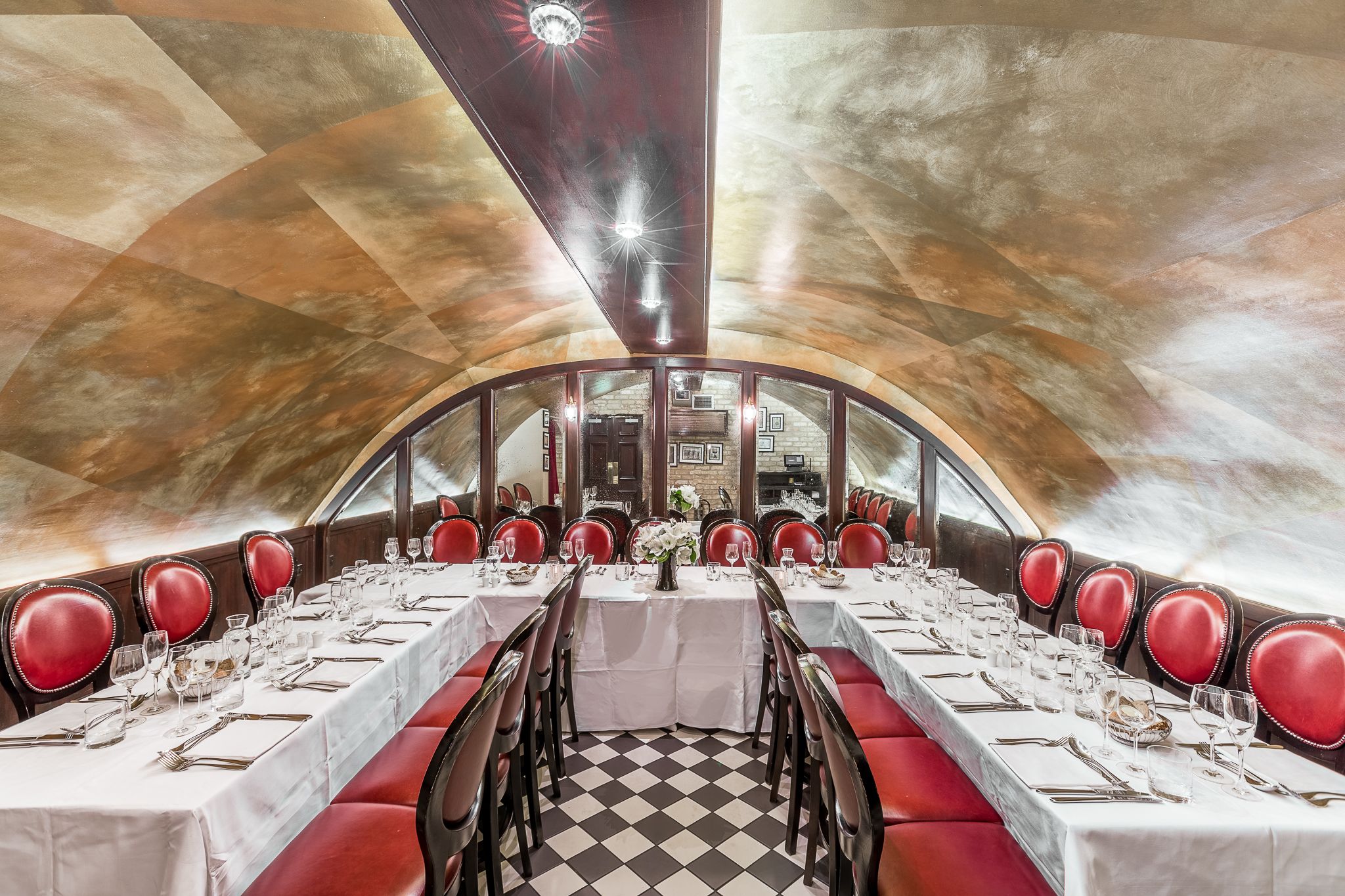 Elegant dining space in Tuttons Vaults with curved ceiling for corporate dinners.