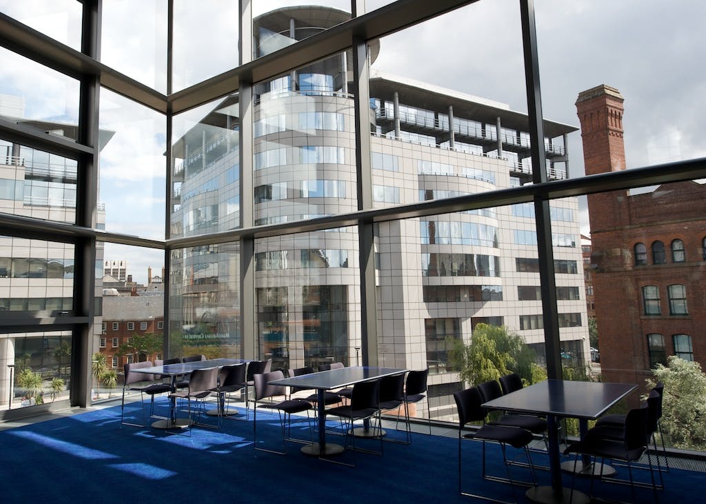 Modern meeting space with large windows at The Bridgewater Hall for events and conferences.