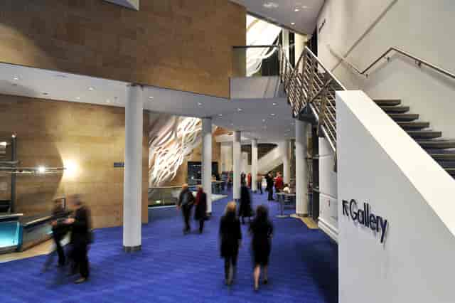 Circle Foyer at The Bridgewater Hall, modern event venue with blue carpet for conferences.