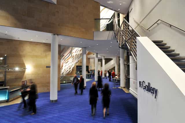 Circle Foyer at The Bridgewater Hall, modern event venue with blue carpet for conferences.
