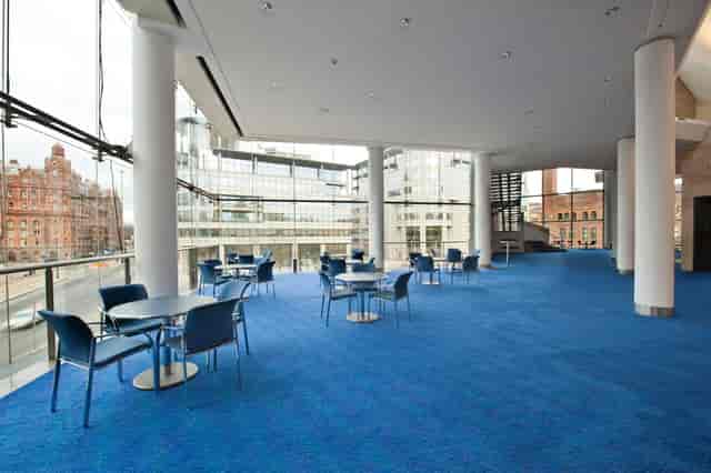 Circle Foyer at The Bridgewater Hall, spacious event space with blue carpet for networking.