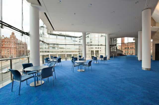 Circle Foyer at The Bridgewater Hall, spacious event space with blue carpet for networking.