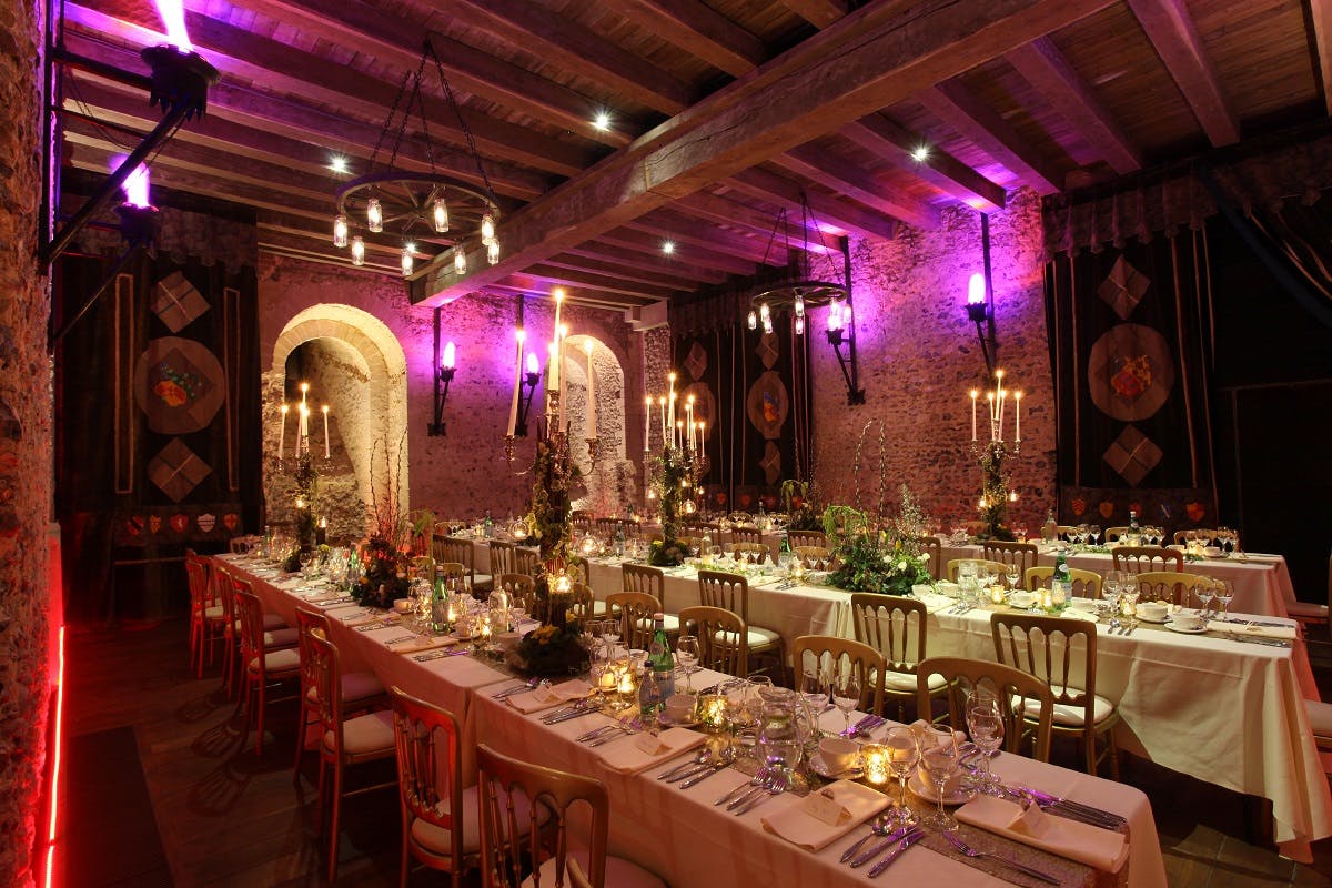 Elegant banquet hall at Hedingham Castle, perfect for weddings and corporate events.