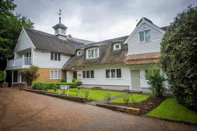 Cottage Suite at Rowhill Grange: thatched roof venue for corporate retreats and events.