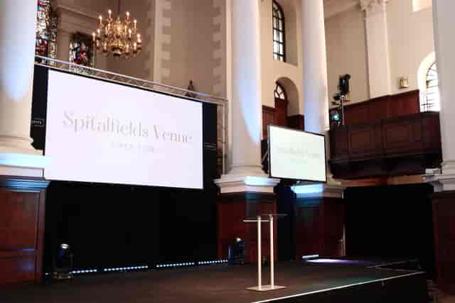 The Nave Spitalfields Venue: historic event space with modern AV setup for corporate conferences.