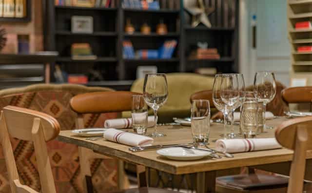 Elegant dining table in The Mezzanine Lounge for intimate gatherings and corporate events.