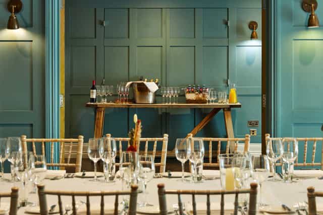 Elegant dining setup in The Large Hub, perfect for sophisticated events and gatherings.