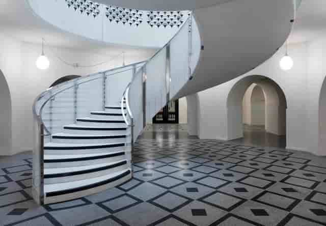 Djanogly Cafe staircase at Tate Britain, modern design for elegant events and gatherings.