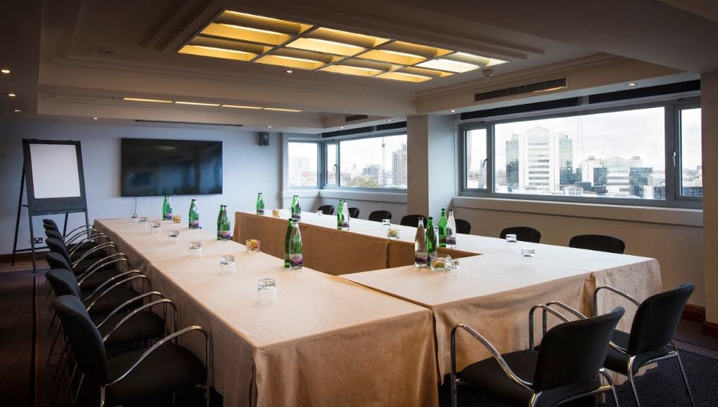 Britannia Suite meeting room with natural light, ideal for corporate events and workshops.