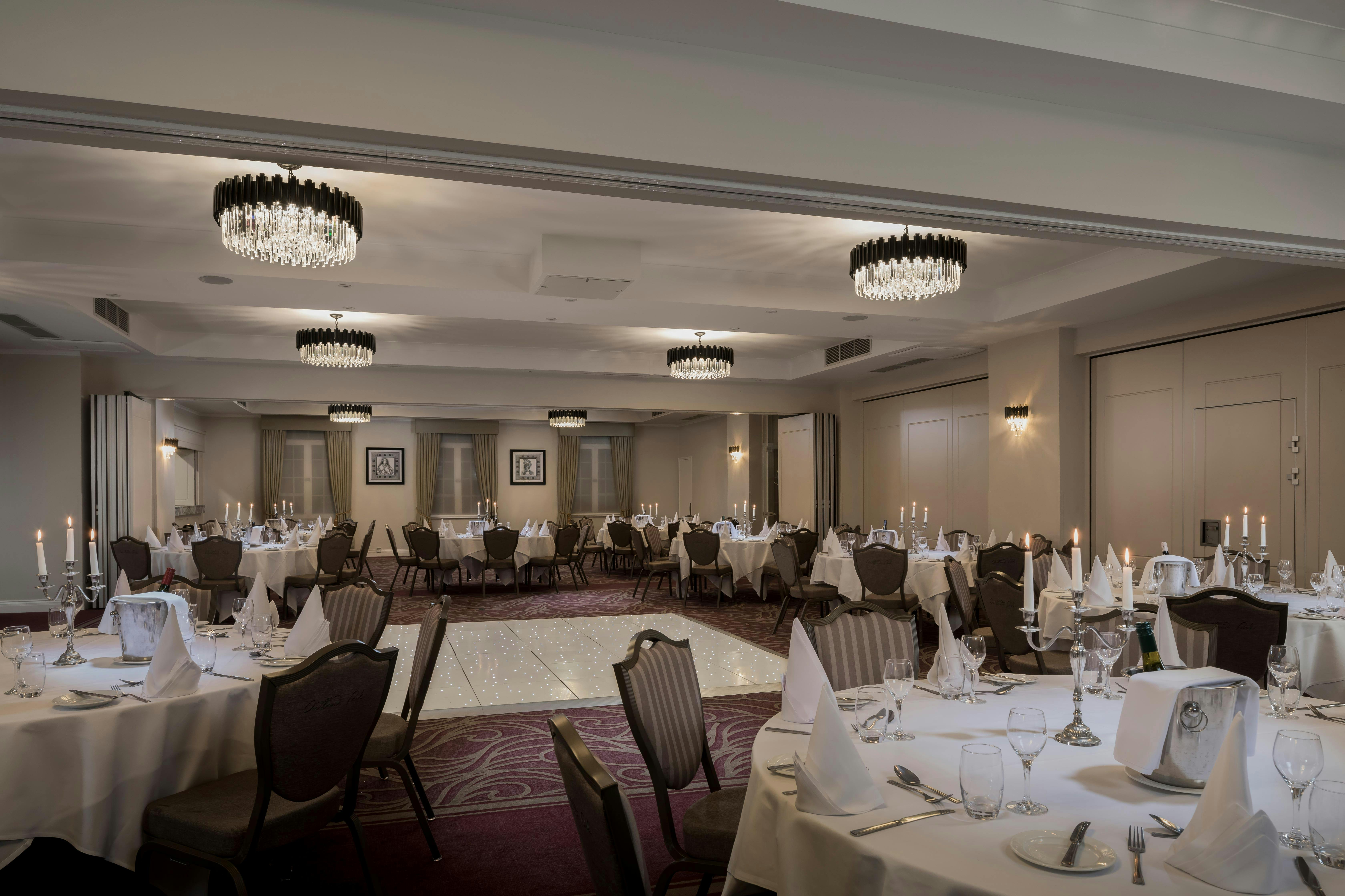 York Suite banquet setup with elegant tables, ideal for weddings and corporate events.